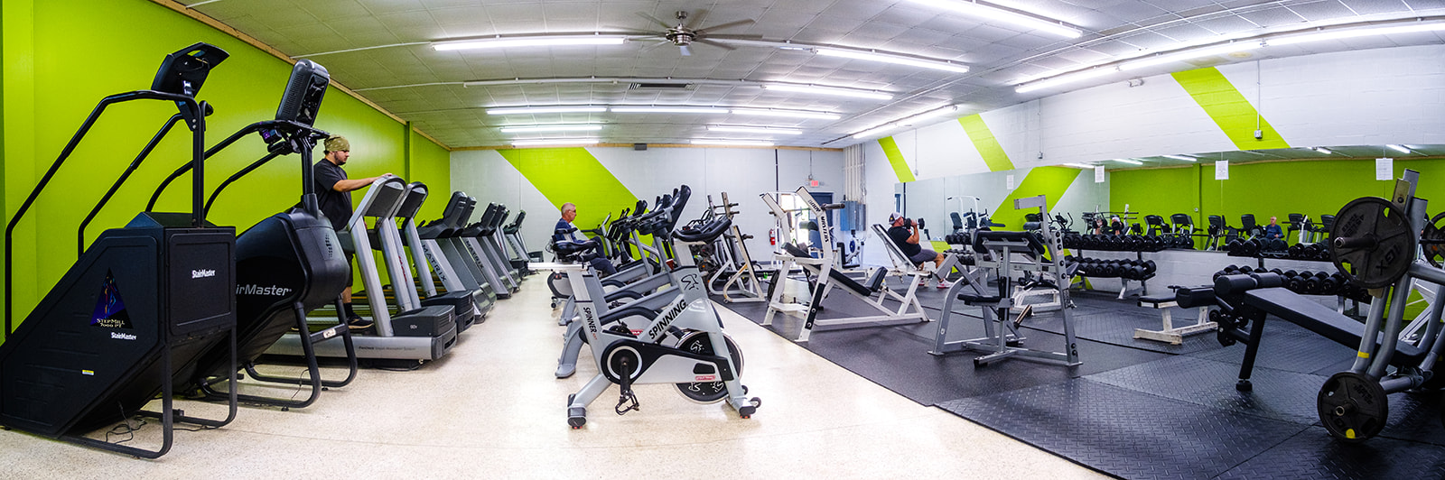 Utopia Fitness Cardio Equipment and weighlifting room